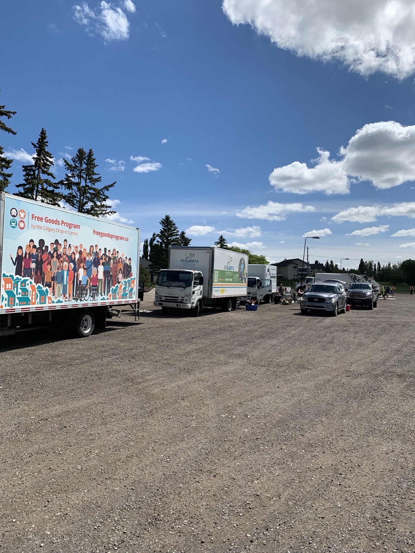 The Free Goods Program truck on site, sitting alongside the queue of cars dropping off items.